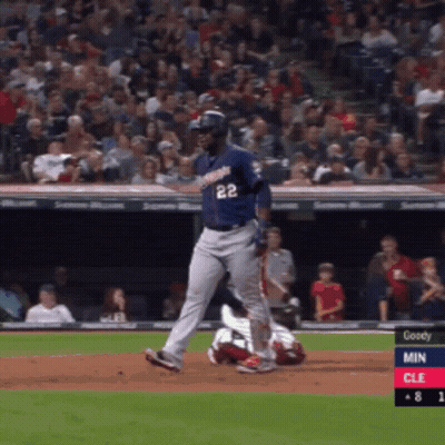 A Baseball Player With The Number 22 On His Jersey Is Running Towards Home Plate GIF