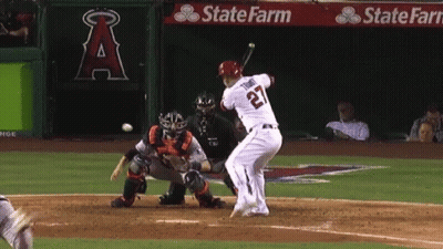 A Baseball Player With The Number 22 On His Jersey Swings His Bat GIF