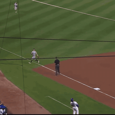 A Baseball Player With The Number 22 On His Jersey Throws A Ball GIF