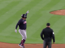 A Baseball Player With The Number 22 On The Back Of His Shirt GIF