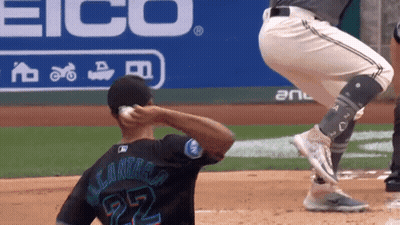 A Baseball Player With The Number 22 On The Back Of His Shirt GIF