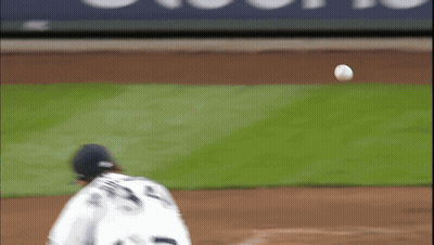 A Baseball Player With The Number 23 On His Back Throws The Ball GIF