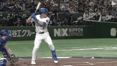 A Baseball Player With The Number 23 On His Jersey Swings At A Ball GIF