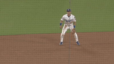 A Baseball Player With The Number 25 On His Shirt GIF