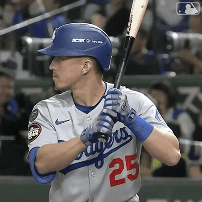 A Baseball Player With The Number 25 On His Shirt GIF