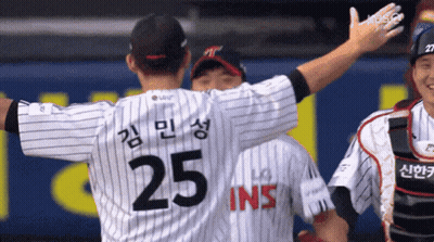 A Baseball Player With The Number 25 On The Back Of His Shirt GIF