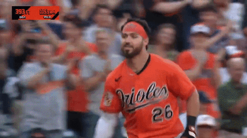 A Baseball Player With The Number 26 On His Jersey Is Running GIF