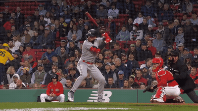 A Baseball Player With The Number 26 On His Jersey Swings His Bat GIF