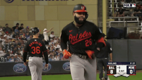 A Baseball Player With The Number 26 On His Jersey Walks Off The Field GIF
