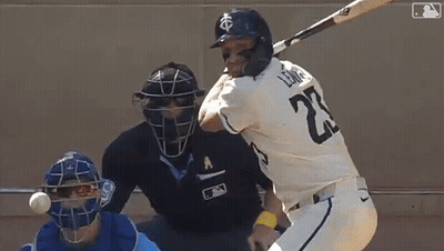 A Baseball Player With The Number 27 On His Jersey Swings At A Pitch GIF