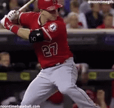 A Baseball Player With The Number 27 On His Red Jersey GIF
