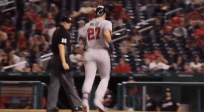 A Baseball Player With The Number 27 On The Back Of His Shirt GIF