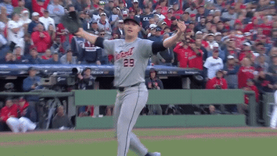 A Baseball Player With The Number 29 On His Jersey Throws A Ball GIF