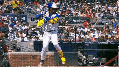A Baseball Player With The Number 3 On His Jersey Swings His Bat GIF
