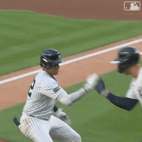 A Baseball Player With The Number 3 On The Back Of His Shirt GIF