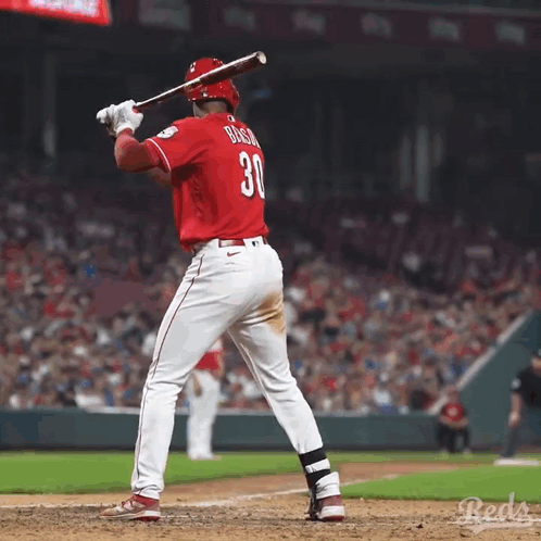 A Baseball Player With The Number 30 On His Jersey Getting Ready To Bat GIF