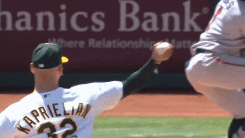 A Baseball Player With The Number 32 On His Back GIF