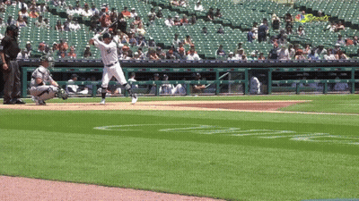 A Baseball Player With The Number 33 On His Jersey Swings At A Pitch GIF