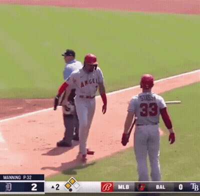 A Baseball Player With The Number 33 On The Back Of His Jersey Stands On The Field GIF