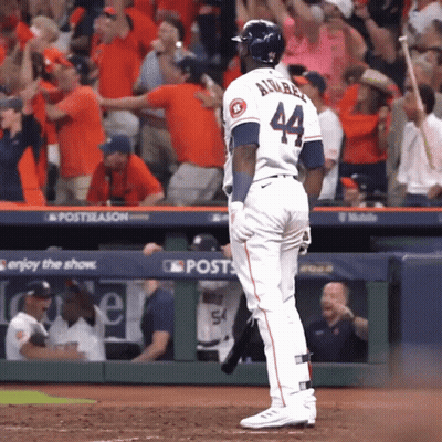 A Baseball Player With The Number 44 On His Jersey Stands On The Field GIF