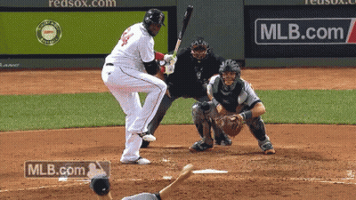 A Baseball Player With The Number 44 On His Jersey Swings At A Pitch GIF
