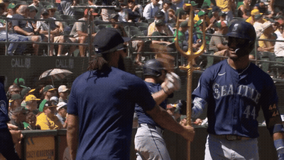 A Baseball Player With The Number 44 On His Jersey Talks To Another Player GIF