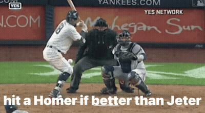 A Baseball Player With The Number 5 On His Jersey Swings At A Ball GIF