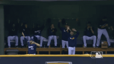 A Baseball Player With The Number 50 On The Back Of His Shirt GIF