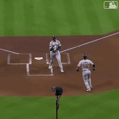 A Baseball Player With The Number 52 On His Jersey Is Running Towards The Base GIF