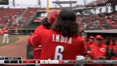 A Baseball Player With The Number 6 On His Back Is Hugging Another Player GIF