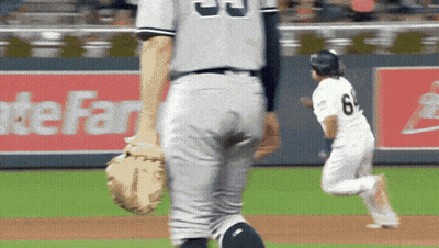 A Baseball Player With The Number 6 On His Jersey Is Running Towards The Base GIF