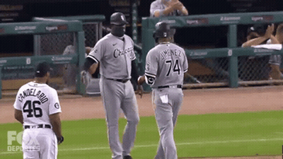 A Baseball Player With The Number 74 On His Jersey GIF