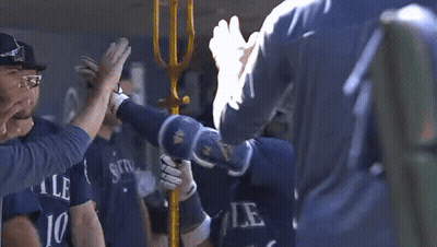 A Baseball Player With The Number 76 On His Jersey Holds A Trident GIF