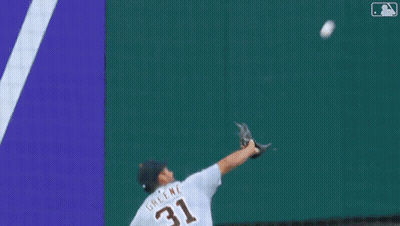 A Baseball Player With The Number 8 On His Jersey Is Laying On The Ground GIF