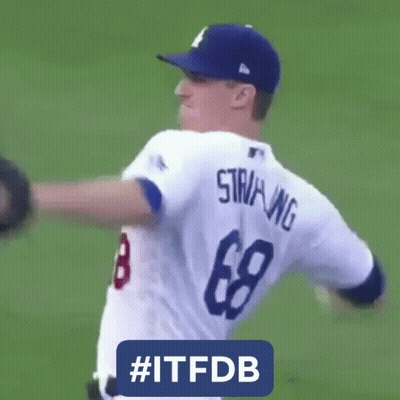 A Baseball Player With The Number 8 On His Jersey Is Throwing A Ball GIF