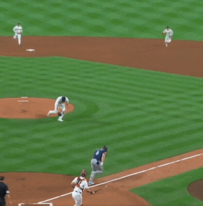A Baseball Player With The Number 8 On His Jersey Is Walking Towards Another Player GIF