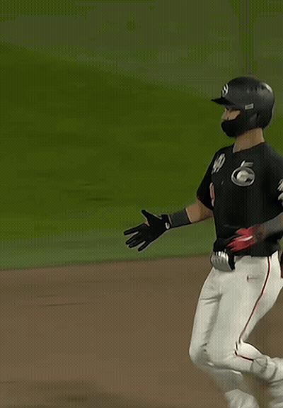 A Baseball Player With The Number 9 On His Back Is Running GIF