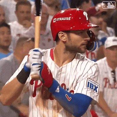 A Baseball Player With The Number 9 On His Helmet Is Holding A Bat GIF