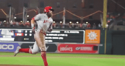 A Baseball Player With The Word Angels On His Shirt GIF