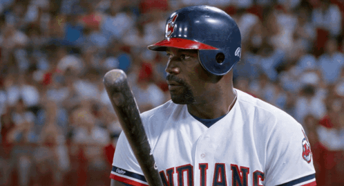 A Baseball Player With The Word Indians On His Shirt GIF