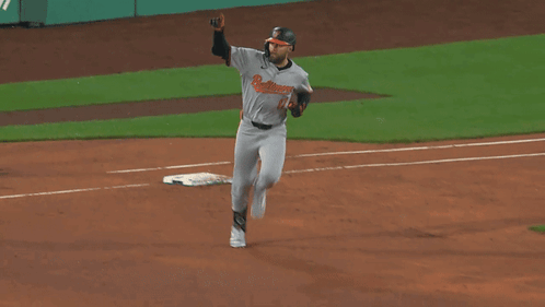 A Baseball Player With The Word Orioles On His Jersey GIF