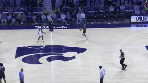 A Basketball Court With A Logo For The Wildcats GIF