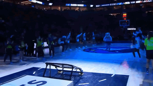 A Basketball Court With A Sign That Says ' Baker ' On It GIF