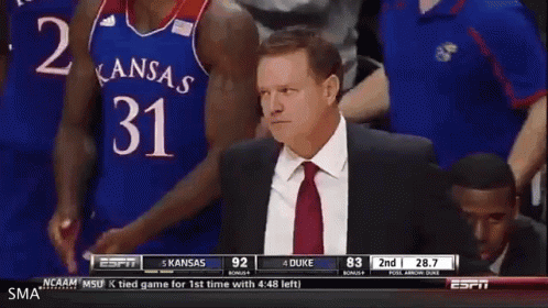 A Basketball Game Between Kansas And Duke Is Being Played GIF