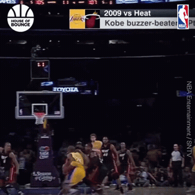 A Basketball Game Between The Heat And The Lakers Is Being Played GIF