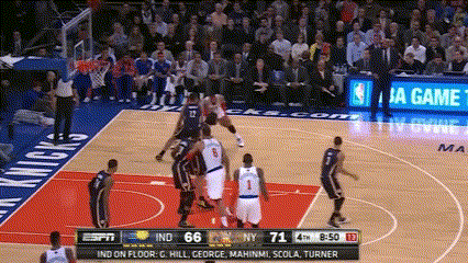A Basketball Game Between The Knicks And The Pistons GIF