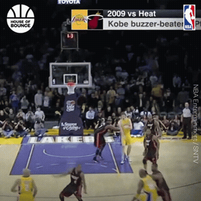 A Basketball Game Between The Lakers And Heat Is Being Played GIF