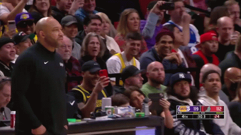A Basketball Game Between The Lakers And The New York Yankees Is Being Played GIF