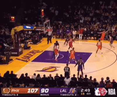 A Basketball Game Between The Lakers And The Suns GIF