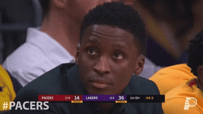 A Basketball Game Between The Pacers And Lakers GIF